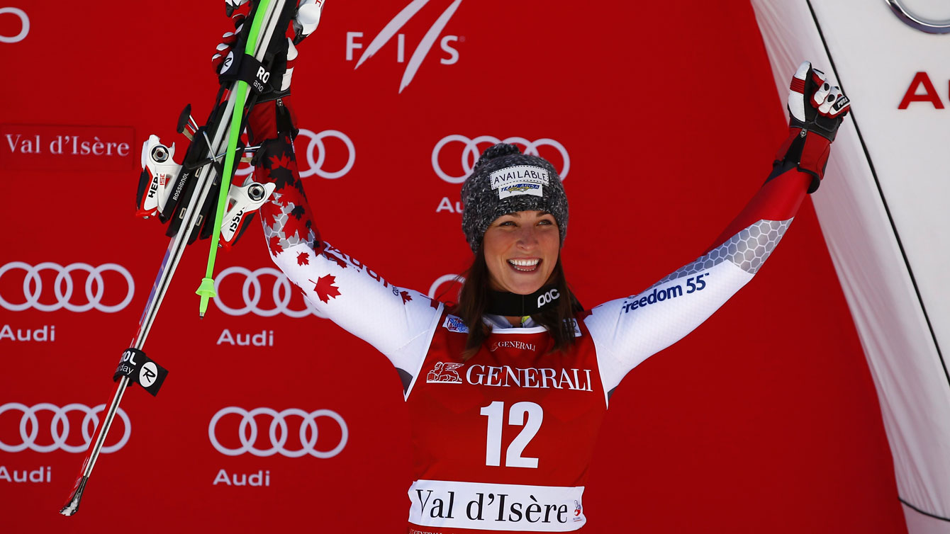 Larisa Yurkiw celebrates on the World Cup podium in Val d'Isere, France after a downhill third place finish on December 19, 2015. 