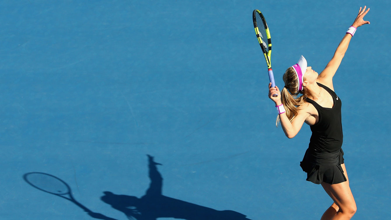 Eugenie Bouchard serves against Bethanie Mattek-Sands of the United States at the Hobart International on January 11, 2016.