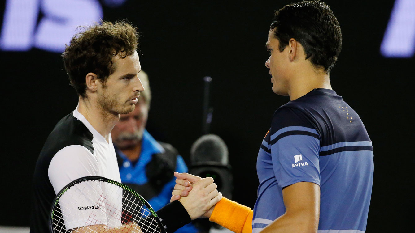 Milos Raonic (right) shakes hands with Andy Murray at the end of the Australian Open semifinal tie on January 29, 2016. 