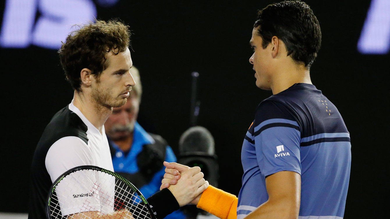 Milos Raonic (right) shakes hands with Andy Murray at the end of the Australian Open semifinal tie on January 29, 2016.