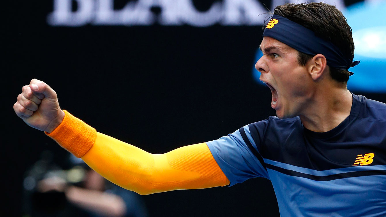 Milos Raonic celebrates his five-set victory over Stan Wawrinka at the Australian Open quarterfinals on July 25, 2016.