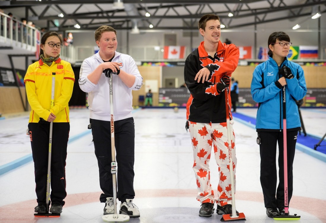 Ruiyi Zhao CHN, Andreas Haarstad NOR, Tyler Tardi CAN and Honoka Sasaki JPN (left to right) seen before the Mixed Doubles Finals Bronze Medal Game at Lillehammer Curling Hall during the Winter Youth Olympic Games, Lillehammer, Norway, 21 February 2016. Photo: Jon Buckle for YIS/IOC Handout image supplied by YIS/IOC