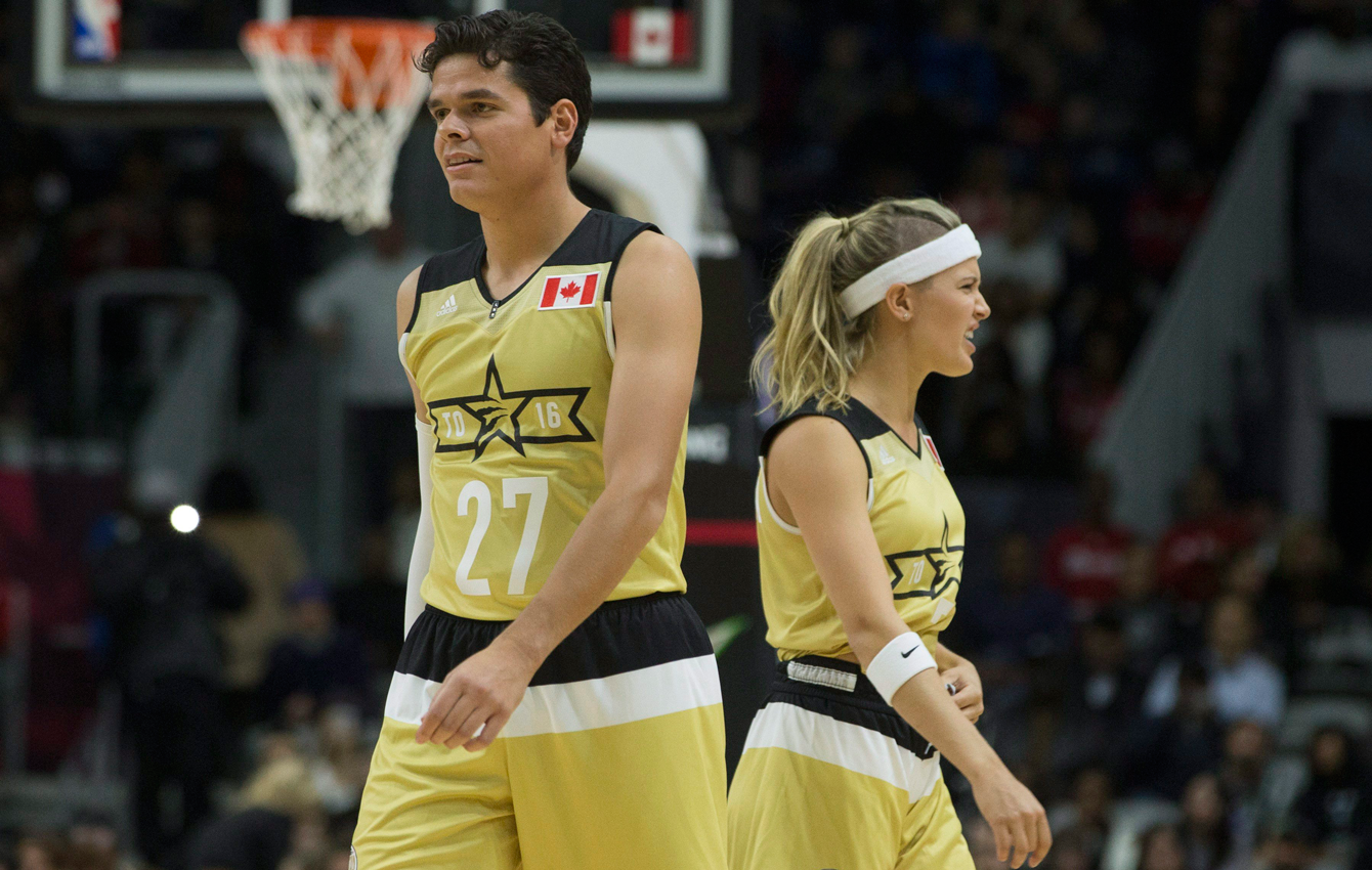 Eugenie Bouchard and Milos Raonic at the NBA All-Star celebrity game on February 12, 2016 in Toronto.