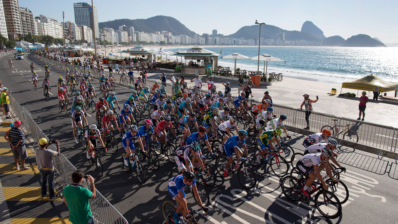Athletes compete during the International Road Cycling Challenge test event, ahead of the Rio 2016 Olympic Games at Copacabana Beach. (Photo: AP/Leo Correa)