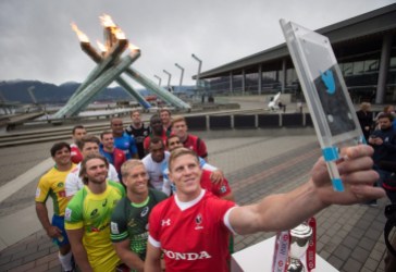 John Moonlight Team Canada captain John Moonlight, front right, uses a Twitter mirror to take a photo of himself with other team captains at the Olympic cauldron to promote the World Rugby Sevens Series' Canada Sevens tournament, in Vancouver, B.C., on Tuesday March 8, 2016. The two day tournament is scheduled to be held March 12 and 13. THE CANADIAN PRESS/Darryl Dyck