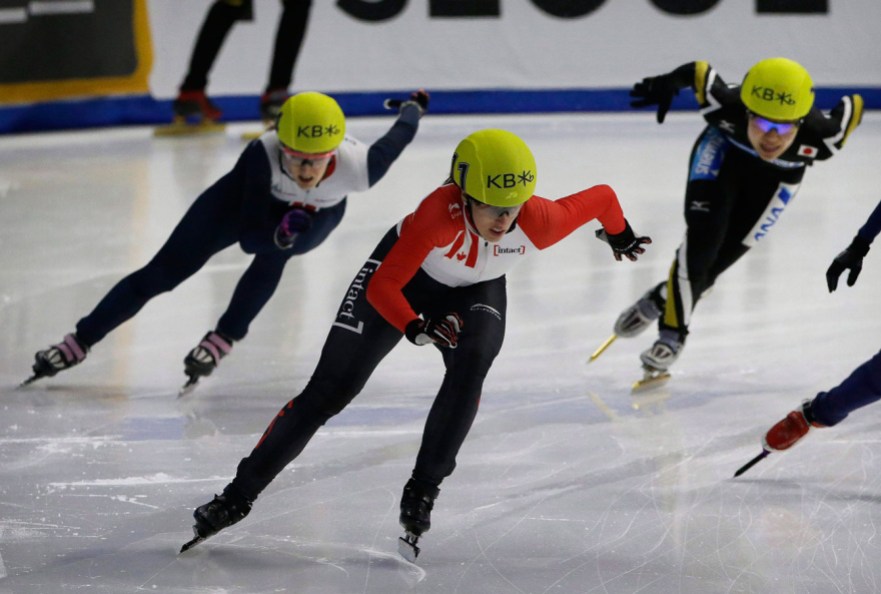11019204 Marianne St-Gelais, center, of Canada competes against Elise Christie of Britain and Yui Sakai, right, of Japan during the women's 1500 meter final race at the ISU World Cup Short Track Speed Skating competition