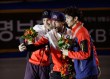 11030219 Hamelin poses for a selfie with the other medallists
