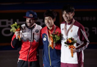 11031168 Hamelin poses with the other medallists