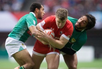 Laurent Couhet, Lucas Hammond, Moises Duque Canada's Lucas Hammond, centre, is tackled by Brazil's Laurent Couhet, left, and Moises Duque during World Rugby Sevens Series' Canada Sevens tournament action, in Vancouver, B.C., on Sunday March 13, 2016. THE CANADIAN PRESS/Darryl Dyck