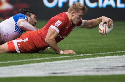 Jean Baptiste Mazoue, John Moonlight Canada's John Moonlight, right, scores the winning try in the final moments of play as France's Jean Baptiste Mazoue tries to stop him during World Rugby Sevens Series' Canada Sevens bowl final action, in Vancouver, B.C., on Sunday March 13, 2016. THE CANADIAN PRESS/Darryl Dyck