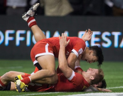 Nathan Hirayama, John Moonlight Canada's Nathan Hirayama, top, and John Moonlight celebrate after Moonlight scored the winning try in the final moments of play against France during World Rugby Sevens Series' Canada Sevens bowl final action, in Vancouver, B.C., on Sunday March 13, 2016. THE CANADIAN PRESS/Darryl Dyck