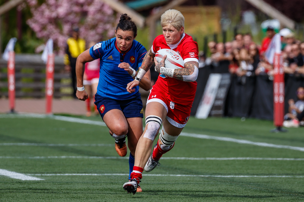 Jen Kish breaks away during Canada's cup quarterfinal match at Canada Sevens in Langford, BC on April 17 (Photo: Lorne Collicutt).