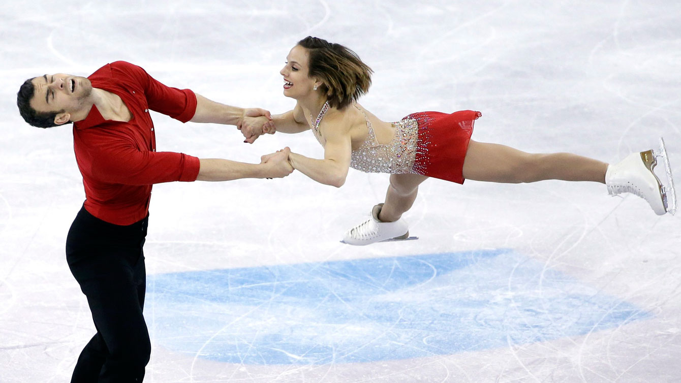 Meagan Duhamel and Eric Radford during their short skate at ISU Figure Skating World Championships on April 1, 2016. 