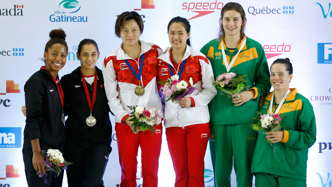 Pamela Ware and Jennifer Abel in the women's 3m synchro podium at the FINA Diving Grand Prix in Gatineau on April 10. (Greg Kolz)