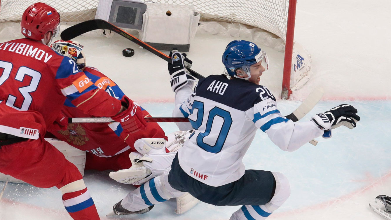 Finland's Sebastian Aho (right) celebrates his goal against Russia at IIHF worlds semifinal on May 21, 2016.