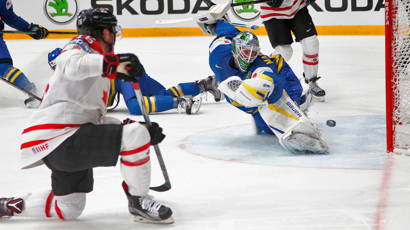 Canada’s Max Domi, left, scores a goal to Sweden’s goalie Jacob Markstrom during the Hockey World Championships quarterfinal match between Canada and Sweden in St.Petersburg, Russia, Thursday, May 19, 2016. (AP Photo/Dmitri Lovetsky)