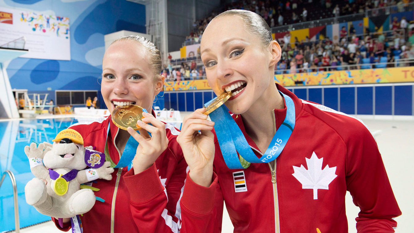 Jacqueline Simoneau and Karine Thomas at Toronto 2015 Pan American Games after winning their duet gold medal. 