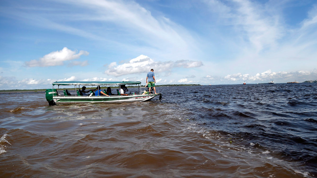 Meeting of waters, the confluence between Rio Negro and Amazon River