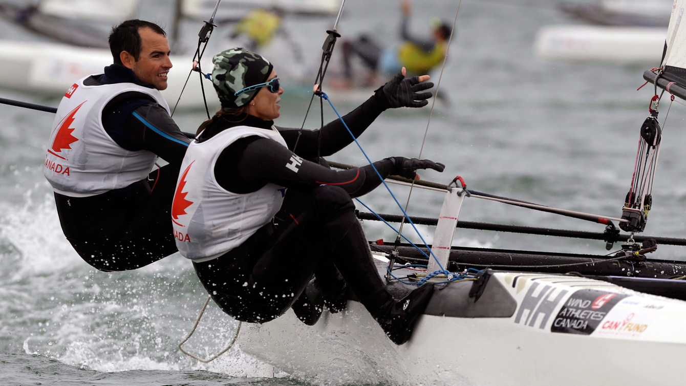 Canada's sailing team of Luke Ramsay, left, and Nikola Girke, right, compete in the Nacra 17 class during the ISAF Sailing World Cup Miami on Jan. 29, 2016. (AP Photo/Lynne Sladky)