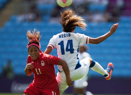 London Olympics Soccer Women Canada's Desiree Scott, left, fights for the ball against Canada's Desiree Scott during their bronze medal women's soccer match at the 2012 London Summer Olympics, Thursday, Aug. 9, 2012 at the Ricoh Arena Stadium in Coventry, England. (AP Photo/Jon Super)