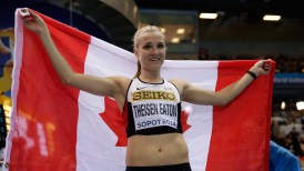 Brianne Theisen-Eaton celebrates her silver medal after the IAAF World Indoor Championships