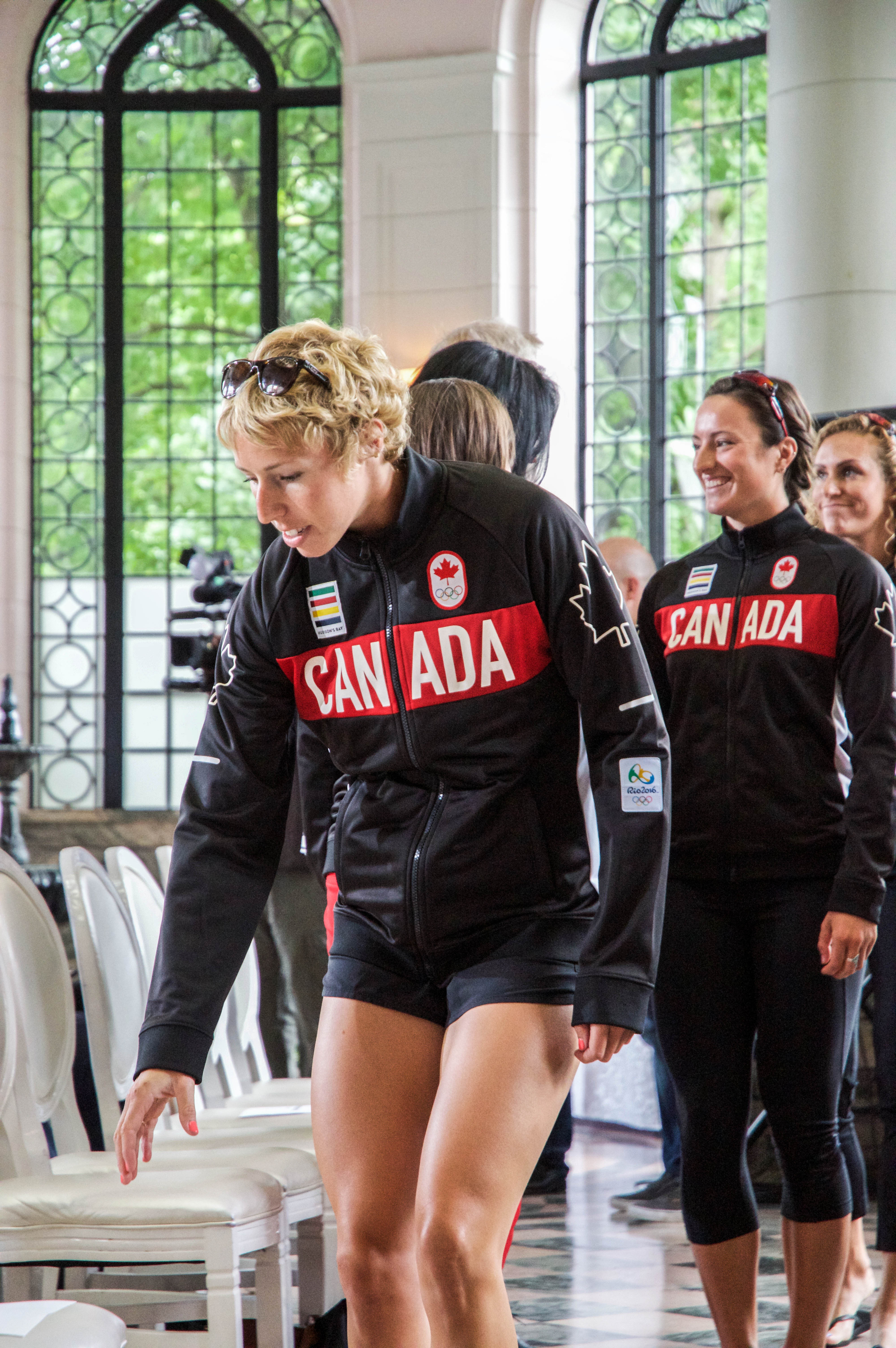 Patricia Obee finds her seat at the Olympic rowing team announcement on June 28, 2016 in Toronto. Photo: Tavia Bakowski