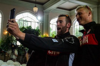 Conlin McCabe and Tim Schrijver take a snapchat at Canada's Olympic rowing team announcement on June 28, 2016 in Toronto. Add "team-canada" on Snapchat to check it out. Photo: Tavia Bakowski