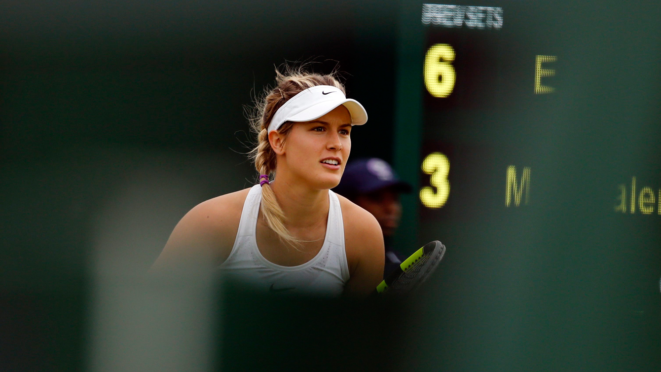 Eugenie Bouchard of Canada waits to receive a serve from Magdalena Rybarikova of Slovakia during their women's singles match on day two of the Wimbledon Tennis Championships in London, Tuesday, June 28, 2016. (AP Photo/Alastair Grant)
