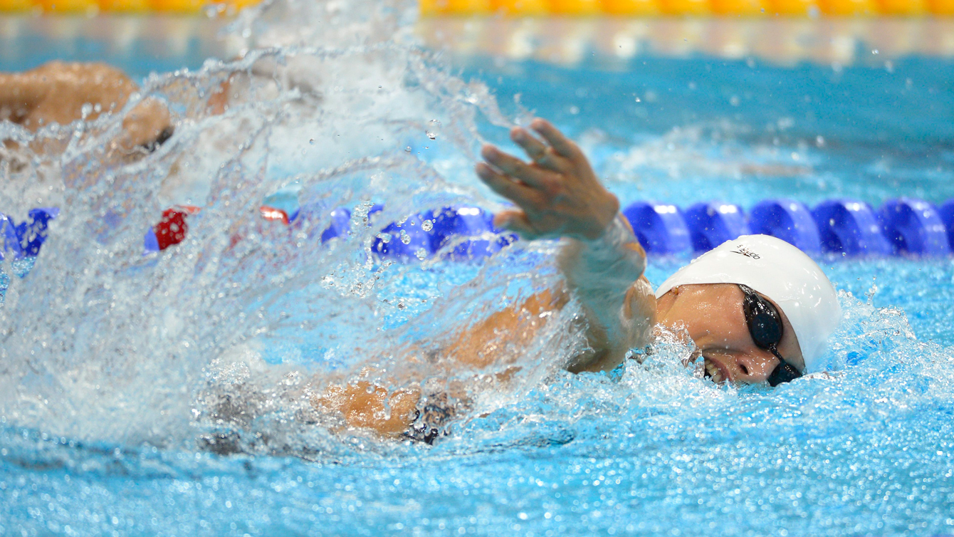 Elena Rublevska of Latvia swims in the 200-meter freestyle during the swimming portion of the women's modern pentathlon at the Aquatics Centre in the Olympic Park during the 2012 Summer Olympics in London, Sunday, Aug. 12, 2012. (AP Photo/Mark J. Terrill)