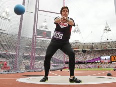 Canada's Heather Steacy competes in a women's hammer throw qualification round during the athletics in the Olympic Stadium at the 2012 Summer Olympics, London, Wednesday, Aug. 8, 2012. (AP Photo/Matt Dunham)