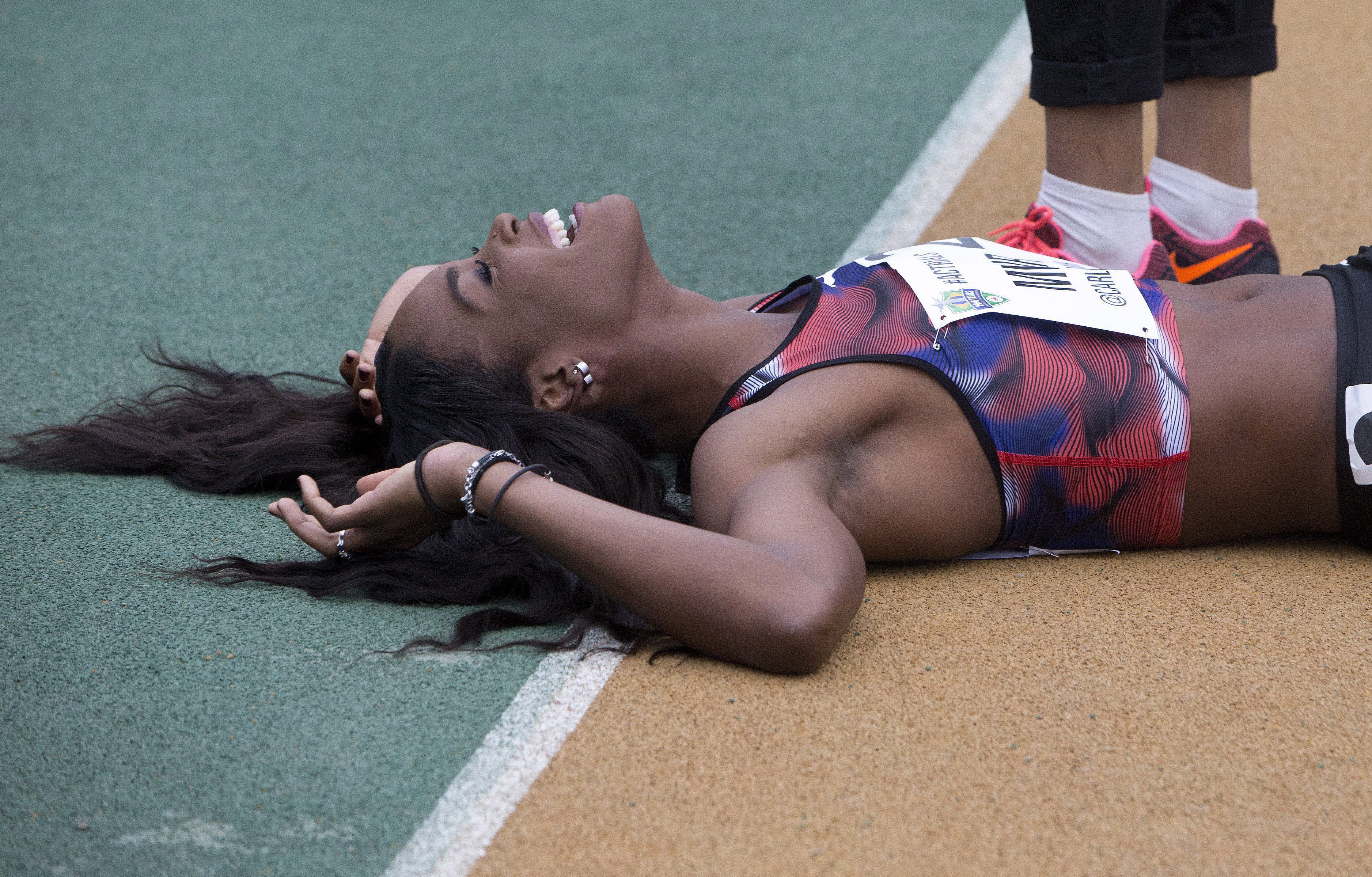 Carline Muir reacts following her win of the senior women's 400 metre final at the Canadian Track and Field Championships and Selection Trials for the 2016 Summer Olympic and Paralympic Games, in Edmonton, Alta., on Saturday, July 9, 2016.THE CANADIAN PRESS/Jason Franson