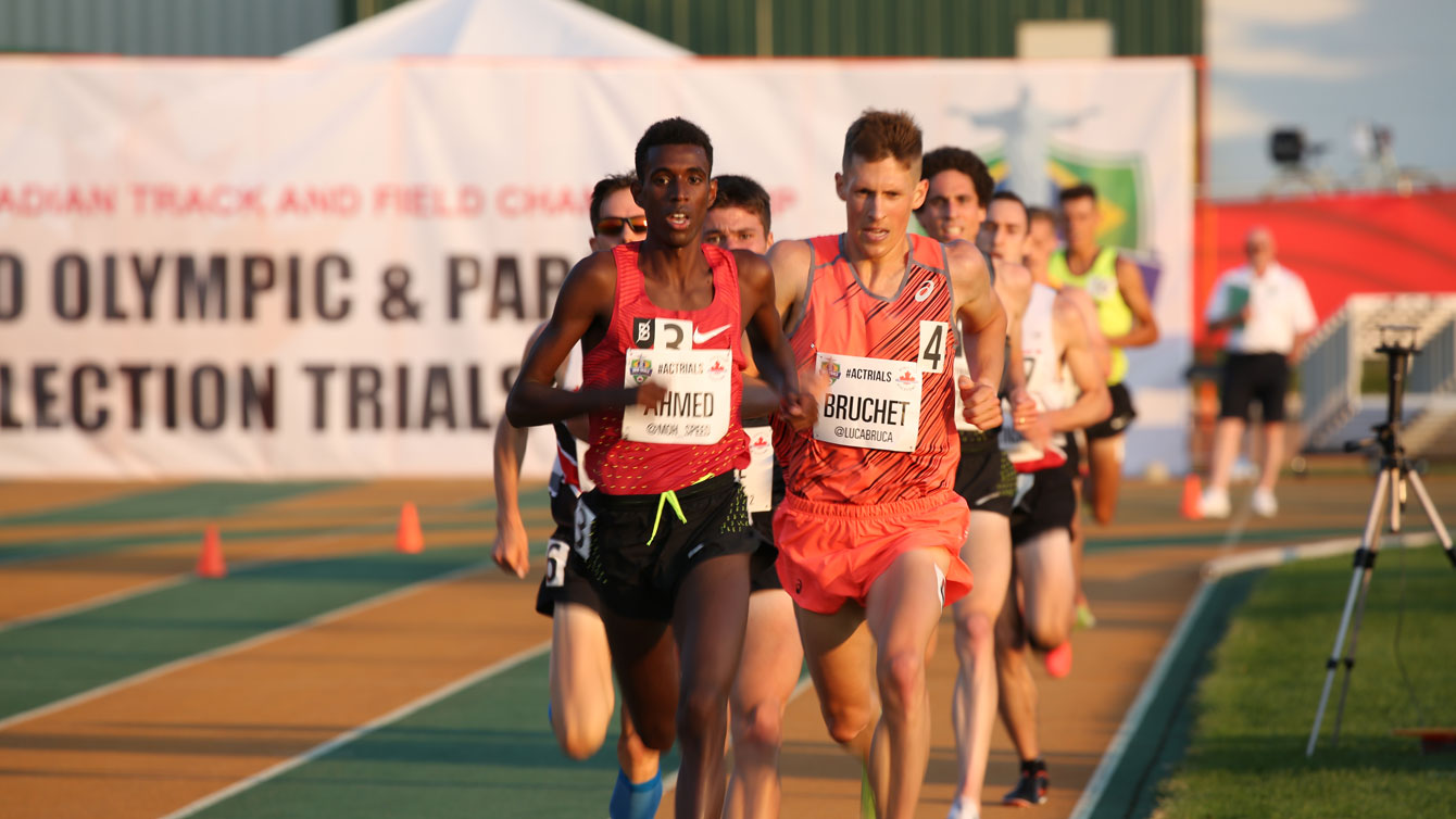 Mo Ahmed, followed by Lucas Bruchet, on their way to securing men's 5000m spots for Rio at Olympic trials on July 7, 2016.