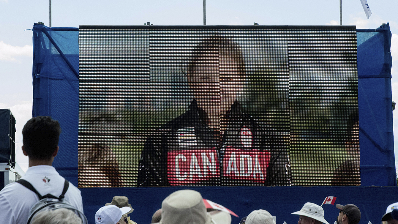 Brooke Henderson calls in to the Team Canada golf announcement from Calgary on July 19, 2016. (Tavia Bakowski/COC)