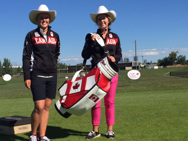 Brooke Henderson (left), and sister, Olympic-bound caddie Brittany Henderson, at a simultaneous white hat ceremony in Calgary, Alberta on the day of the Olympic team announcement in Oakville, Ontario, July 19, 2016.