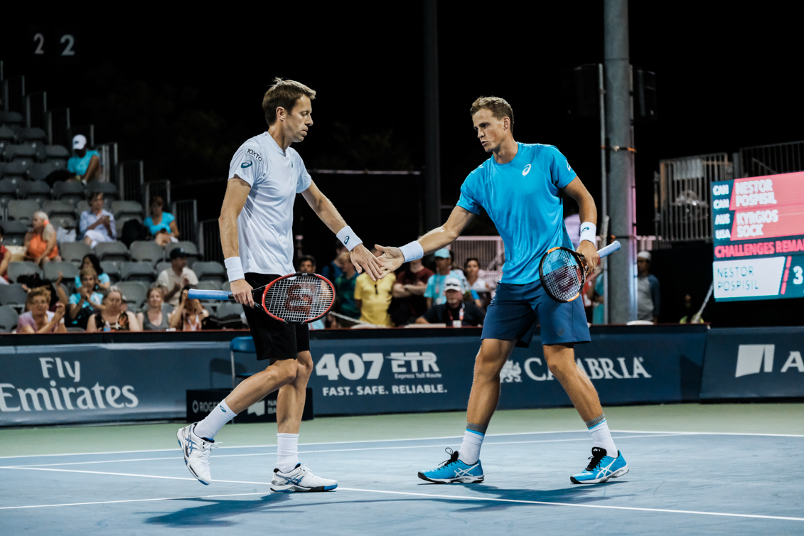Canada’s Vasek Pospisil and Daniel Nestor play doubles at the Rogers Cup in Toronto on July 28, 2016. (Thomas Skrlj/COC)