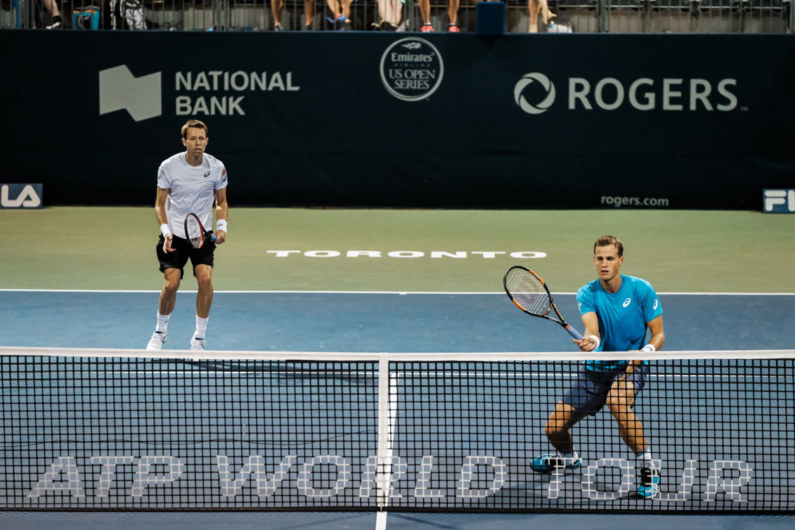 Canada’s Vasek Pospisil and Daniel Nestor play doubles at the Rogers Cup in Toronto on July 28, 2016. (Thomas Skrlj/COC)