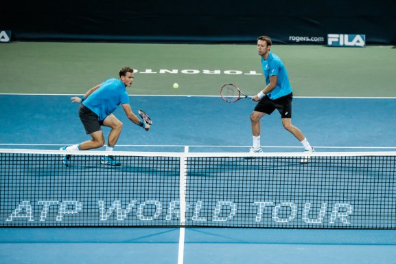 Nestor and Pospisil Canada’s Vasek Pospisil and Daniel Nestor play doubles in the quarterfinals of the Rogers Cup in Toronto on July 29, 2016. (Thomas Skrlj/COC)