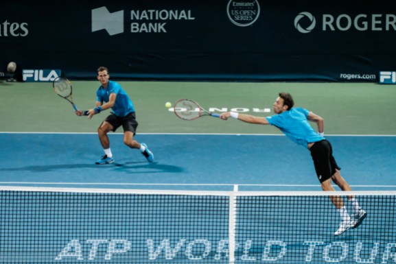 Nestor and Pospisil Canada’s Vasek Pospisil and Daniel Nestor play doubles in the quarterfinals of the Rogers Cup in Toronto on July 29, 2016. (Thomas Skrlj/COC)