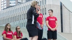 Ghislaine Landry speaks to Curt Harnett, Chef de Mission for Team Canada during Rio 2016 at the rugby send-off party on July 26, 2016. (Tavia Bakowski/COC)