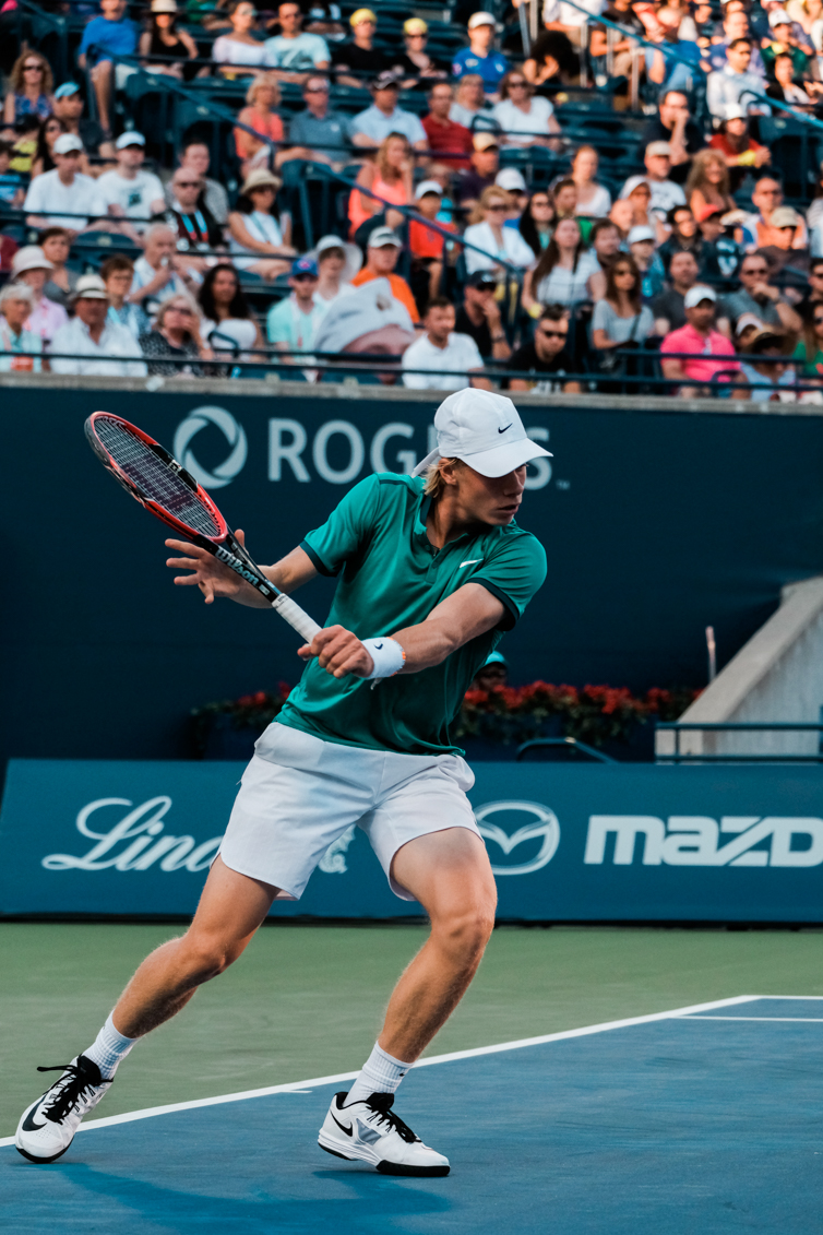 Denis getting ready to return a shot