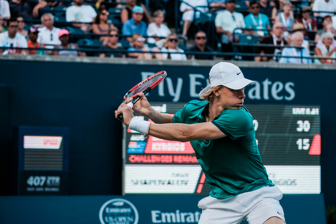 Denis getting ready to return a shot