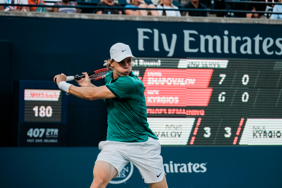 Denis getting ready to return a shot