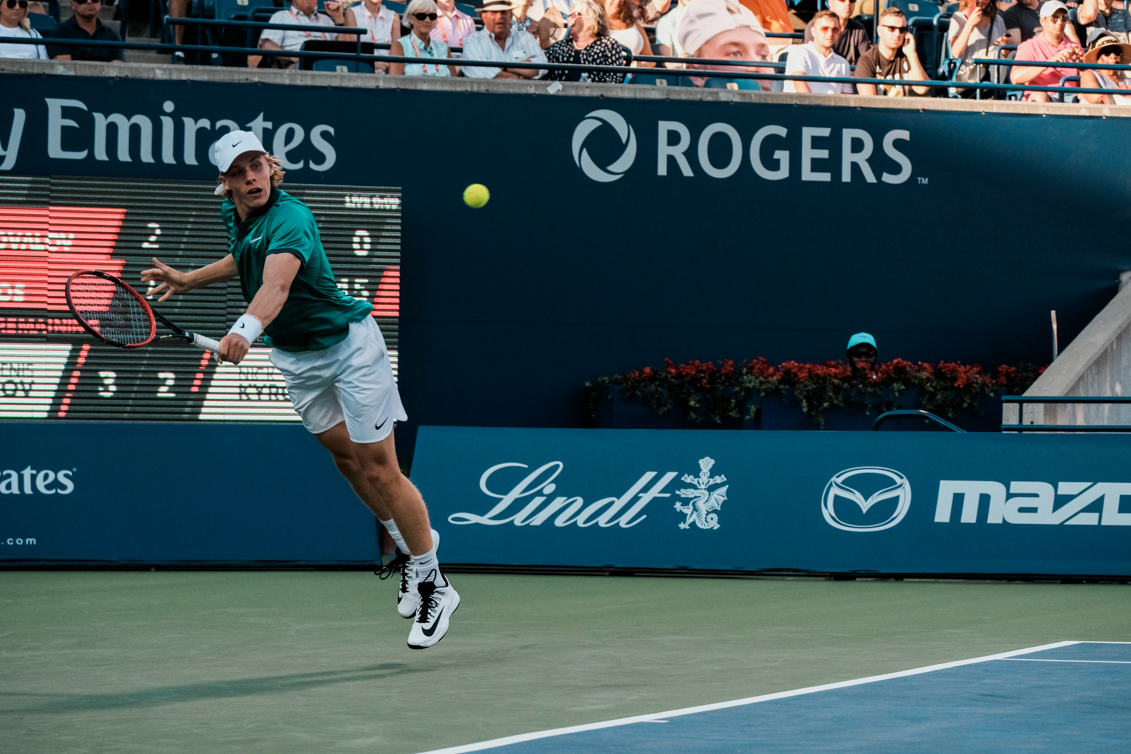 Denis getting ready to return a shot