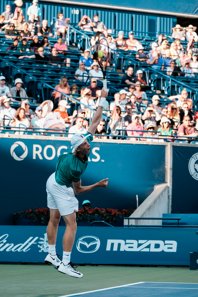 Denis in the middle of erving