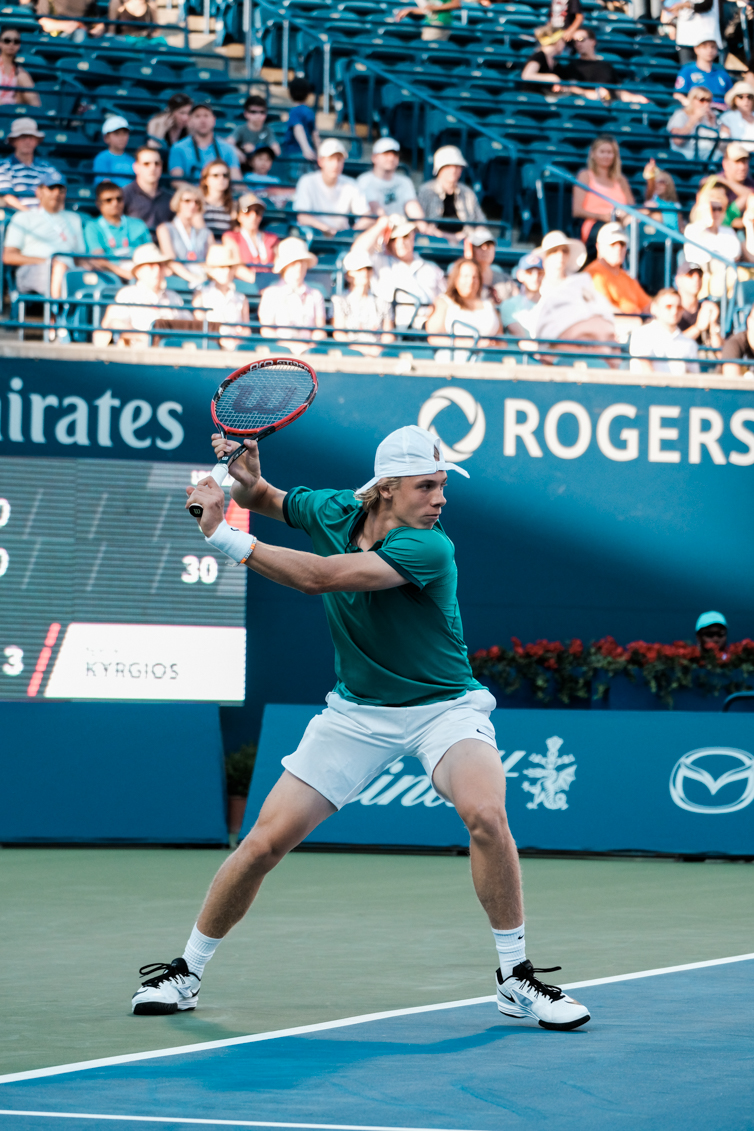 Denis getting ready to return a shot