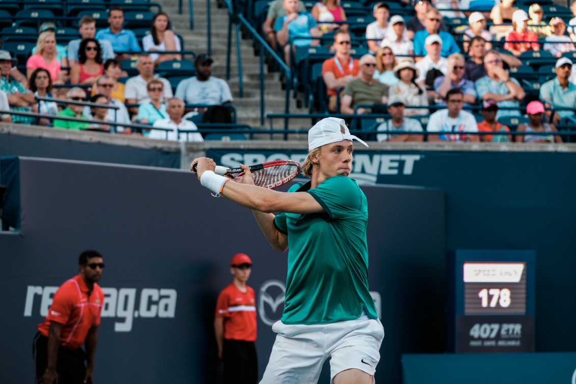 Denis getting ready to return a shot