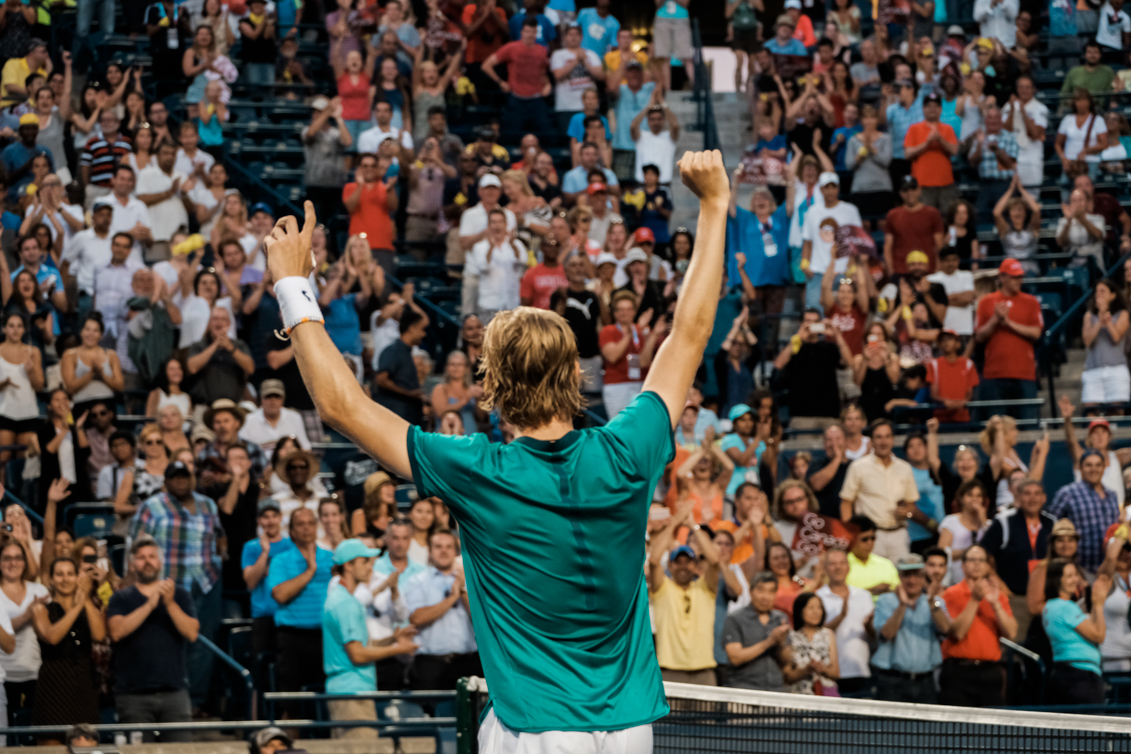 Denis waving to the crowd