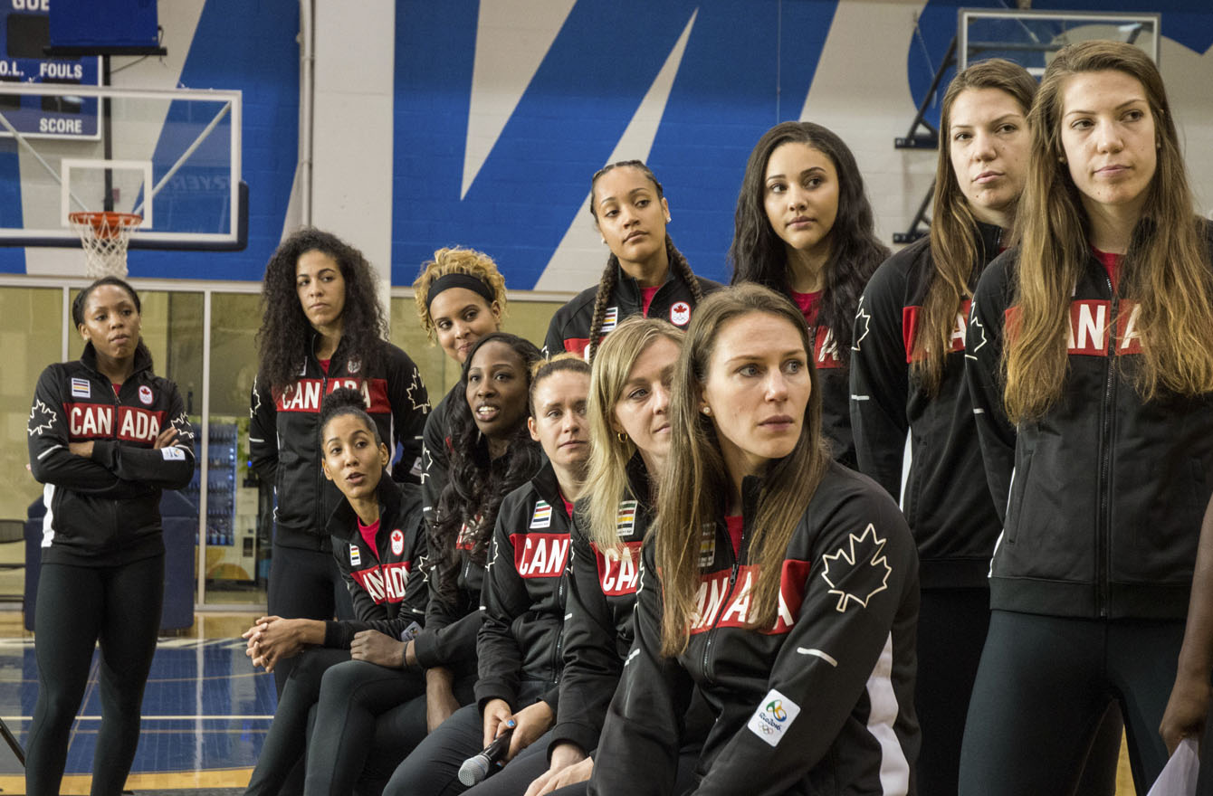 Members of the Canadian Olympic women's basketball team watch a video at Toronto's Mattamy Athletic Centre on July 22, 2016. (Tavia Bakowski/COC)