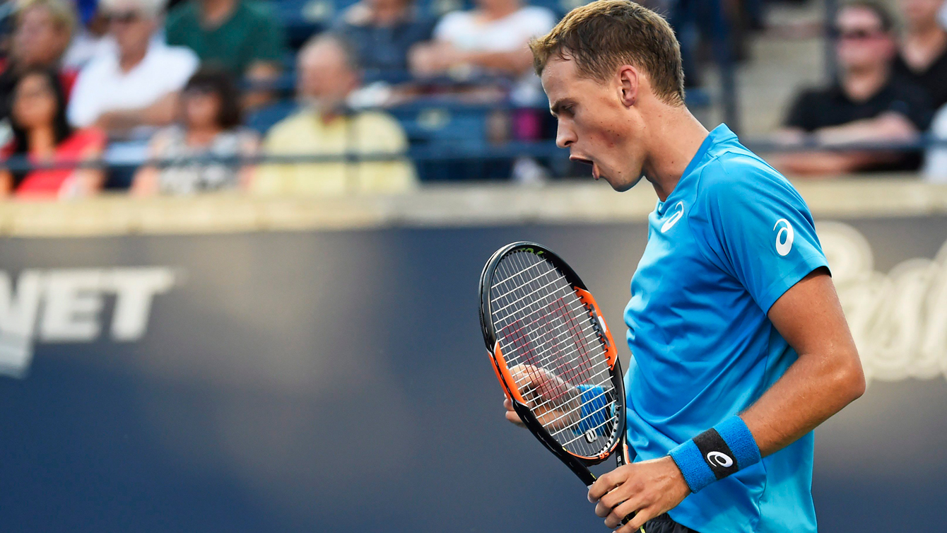 Vasek Pospisil of Canada reacts during his match against Jeremy Chardy of France during first round Rogers Cup tennis action in Toronto on Tuesday, July 26, 2016. THE CANADIAN PRESS/Nathan Denette