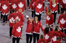 Members of team Canada take a selfie during the opening ceremony of the 2016 Summer Olympics in Rio de Janeiro, Brazil, Friday, Aug. 5, 2016. (AP Photo/Charlie Riedel)